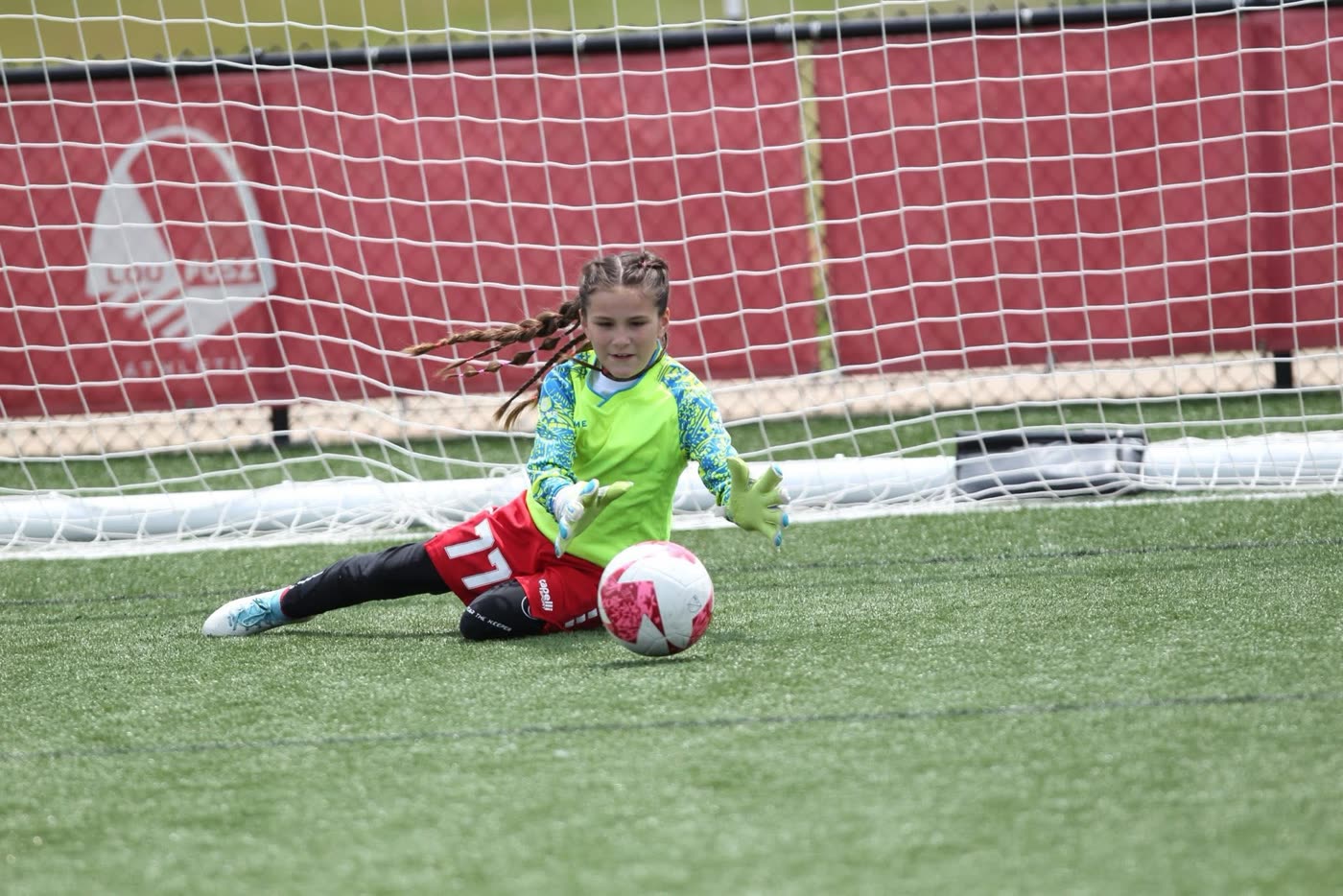 A St. Louis Legends goalkeeper making a save in front of the goal